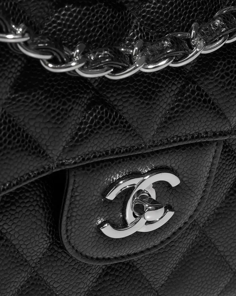 Details on a Chanel Timeless Jumbo Caviar in Black, sold on saclab.com