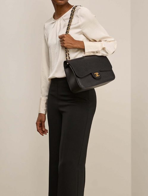 Chanel Timeless Jumbo Black on Model | Sell your designer bag on Saclab.com