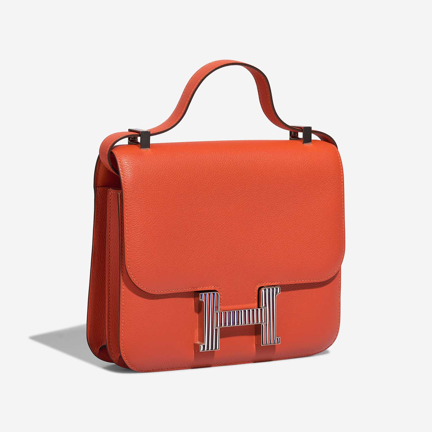 Hermès Constance 24 OrangePoppy Side Front  | Sell your designer bag on Saclab.com