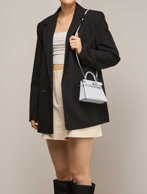 Hermès Kelly Mini Epsom Bleu Brume on Model | Sell your designer bag