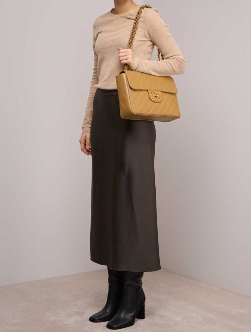 Chanel Timeless Jumbo Lamb Beige on Model | Sell your designer bag