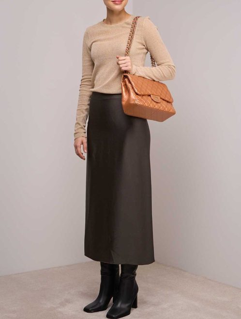 Chanel Timeless Jumbo Lamb Copper on Model | Sell your designer bag