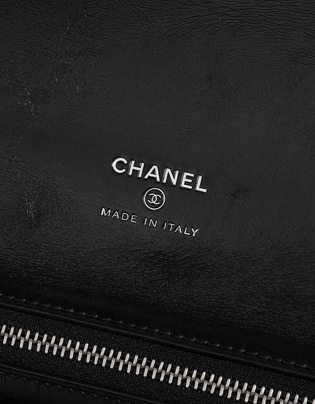 Chanel 31 Clutch Aged Calf Black / White Logo | Sell your designer bag