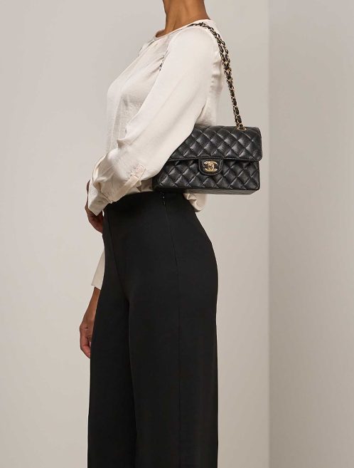 Chanel Timeless Small Caviar Black on Model | Sell your designer bag