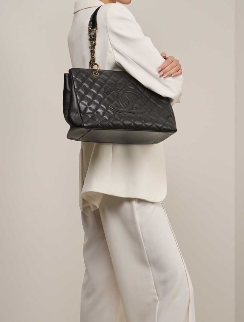 Chanel Shopping Tote Grand on Model | Sell your designer bag