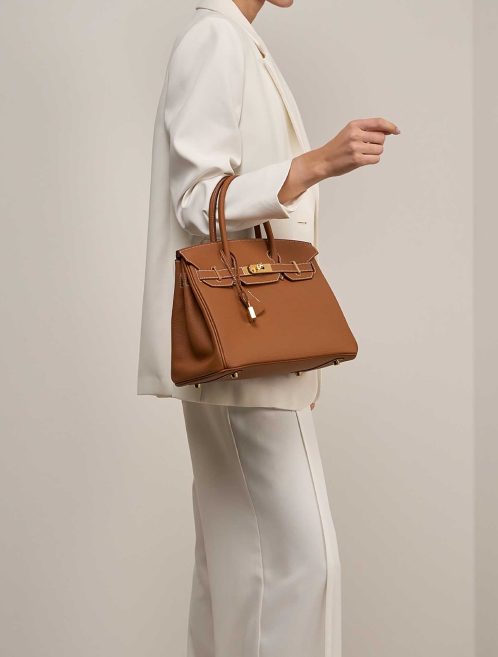 Hermès Birkin 30 Togo Leather Gold on Model | Sell your designer bag