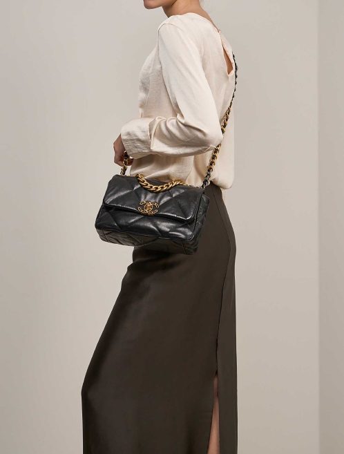 Chanel 19 Flap Bag Goat Black  on Model | Sell your designer bag