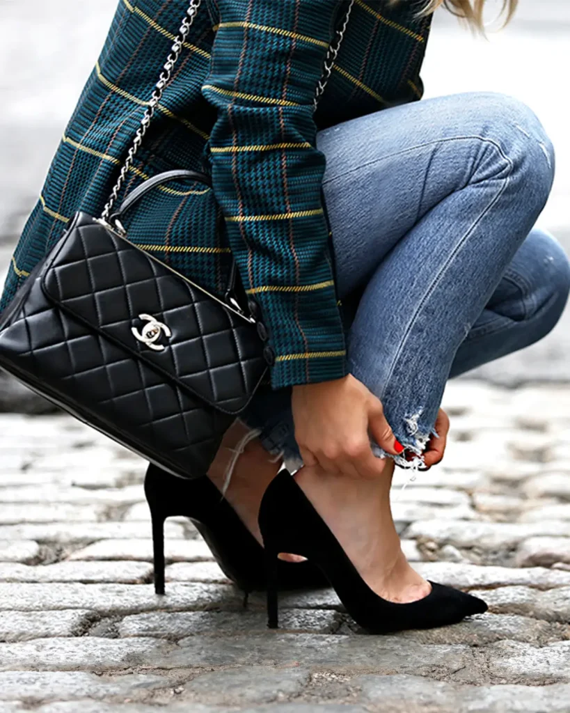 Styled Trendy CC with jeans, heels and plaid blazer. Image: Brooklyn Blonde