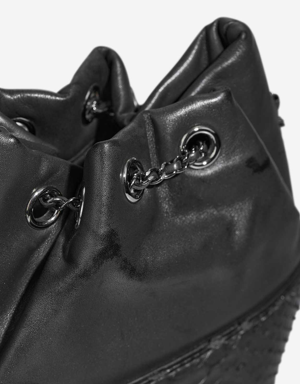 Chanel Bucket Bag Small Python / Lamb Metallic Grey Signs of wear | Sell your designer bag