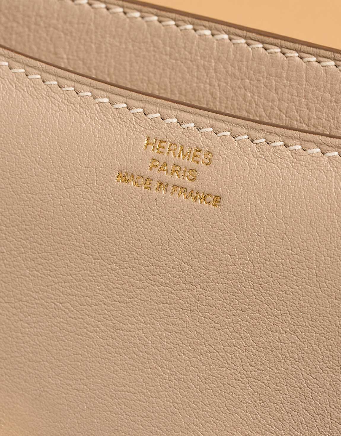 Hermès Constance 18 Swift Biscuit / Moutarde Logo | Sell your designer bag