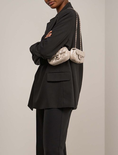 Chanel Timeless Extra Mini Lamb Gold on Model | Sell your designer bag