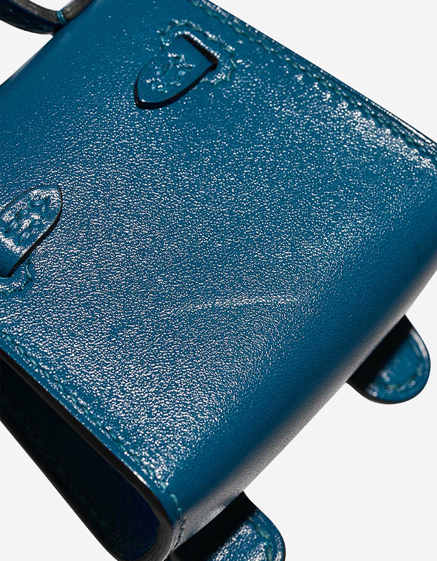 Hermès Kelly Doll Bag Charm Tadelakt Bleu Izmir / Vert Bosphore / Bleu Brume / Jaune Bourgeon Signs of wear | Sell your designer bag