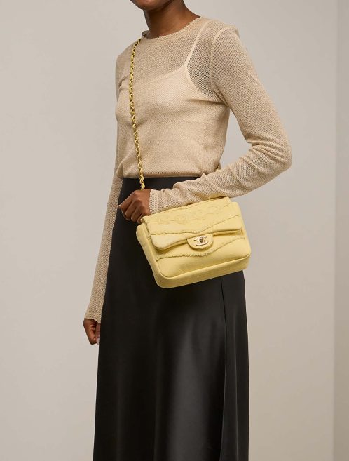 Chanel Timeless Mini Rectangular Cotton Light Yellow on Model | Sell your designer bag