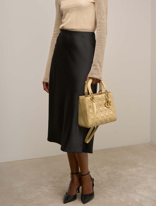 Dior Lady Medium Patent Beige on Model | Sell your designer bag