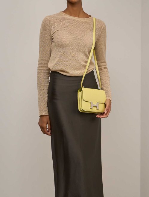 Hermès Constance 18 Chèvre Mysore Jaune Bourgeon on Model | Sell your designer bag