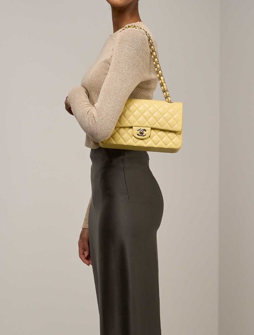 Chanel Timeless Medium Caviar Yellow on Model | Sell your designer bag