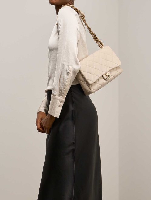 Chanel Flap Bag Medium Lamb Off White on Model | Sell your designer bag