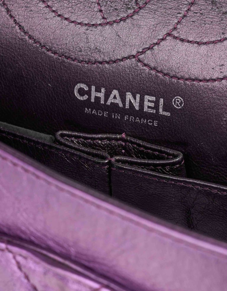 Chanel 2.55 Reissue 227 Aged Calf Metallic Purple Logo | Sell your designer bag