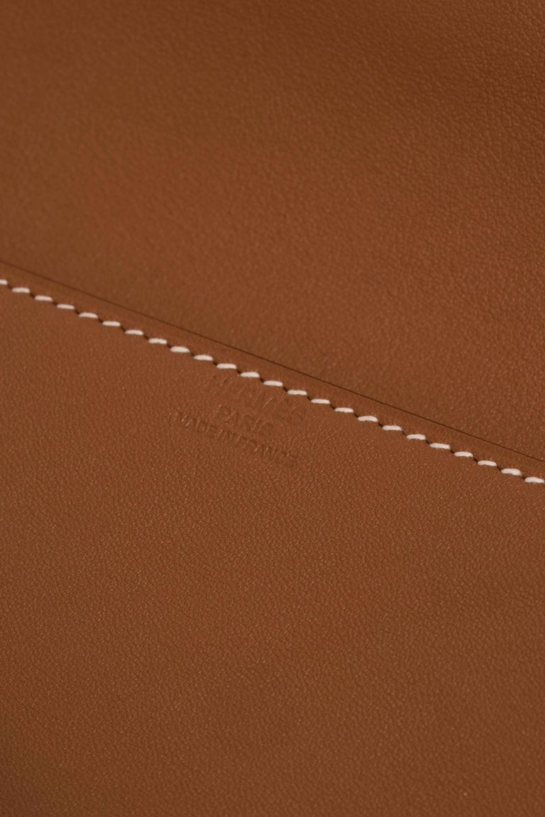 Hermès Birkin Shadow Cut Clutch Swift Gold Logo | Sell your designer bag