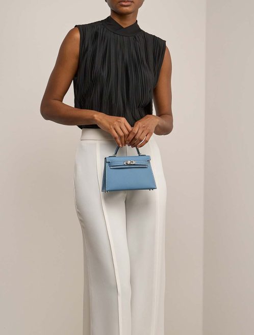 Hermès Kelly Mini Epsom Bleu Jean on Model | Sell your designer bag