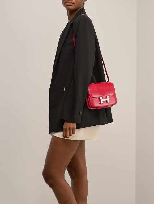Hermès Constance 18 Salvator Lizard Rouge Exotique on Model | Sell your designer bag