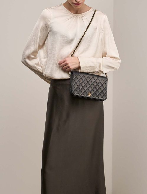 Chanel Timeless Medium Lamb Black on Model | Sell your designer bag
