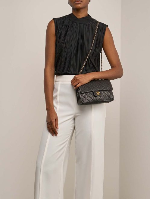 Chanel Timeless Small Lamb Black on Model | Sell your designer bag