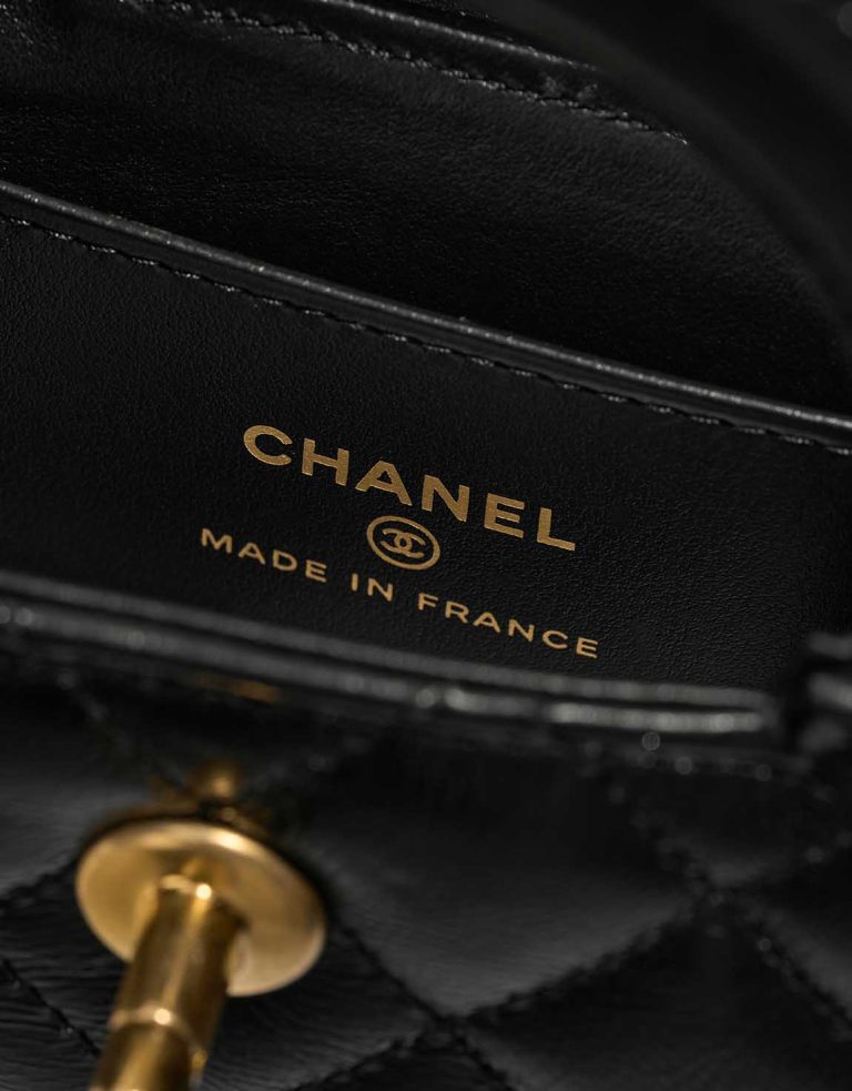 Chanel Kelly Micro Aged Calf Black Logo | Sell your designer bag