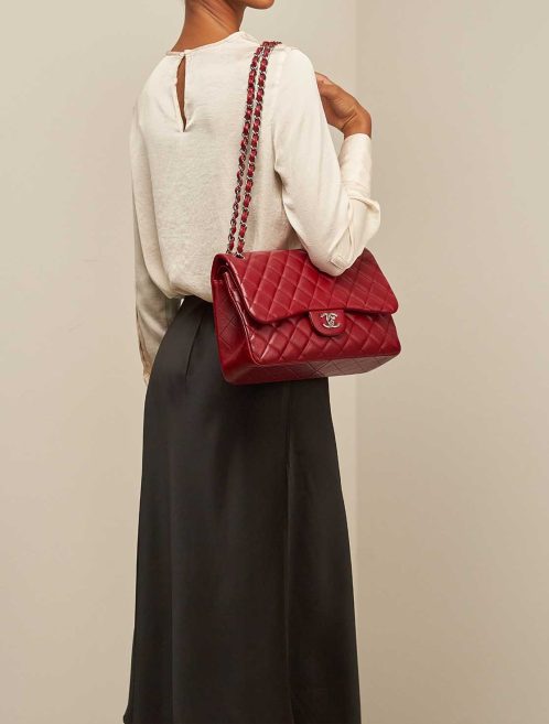 Chanel Timeless Jumbo Caviar Red on Model | Sell your designer bag