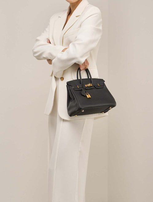 Hermès Birkin 25 Togo Black  on Model | Sell your designer bag
