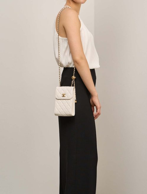 Chanel Phone Holder Lamb White on Model | Sell your designer bag