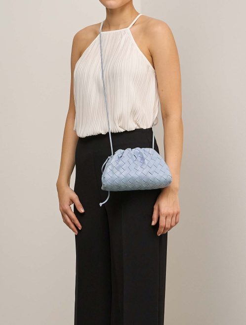 Bottega Veneta Pouch Mini Lamb Light Blue on Model | Sell your designer bag