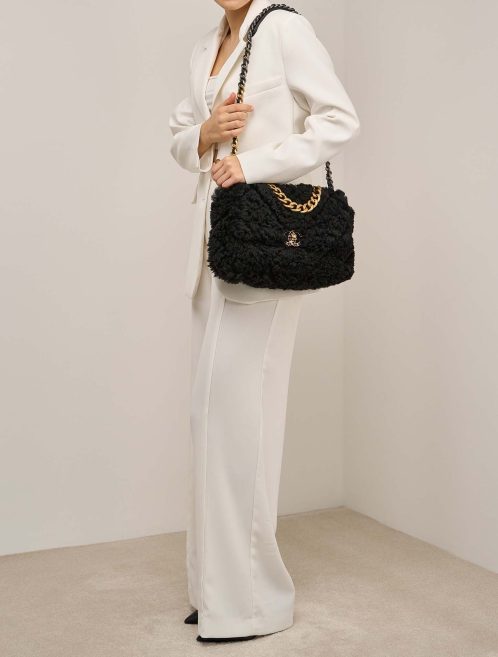 Chanel 19 Flap Bag Large Shearling Black on Model | Sell your designer bag