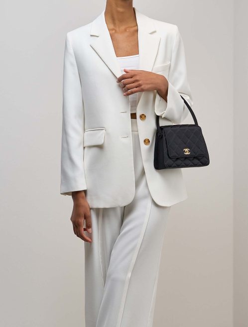 Chanel Timeless Handle Mini Satin Black on Model | Sell your designer bag