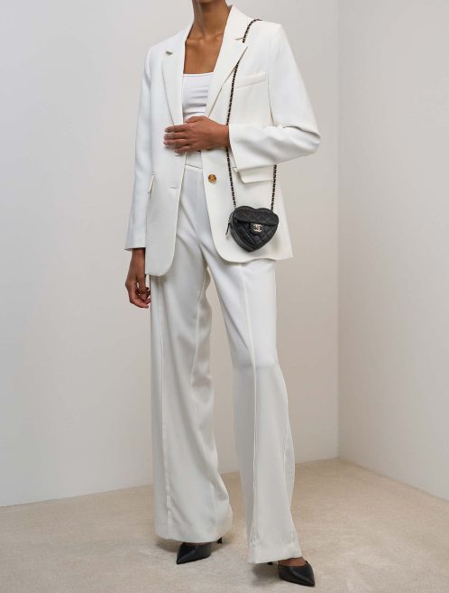 Chanel Timeless Heart Small Lamb Black on Model | Sell your designer bag