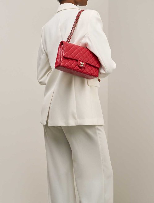 Chanel Timeless Medium Caviar Red on Model | Sell your designer bag