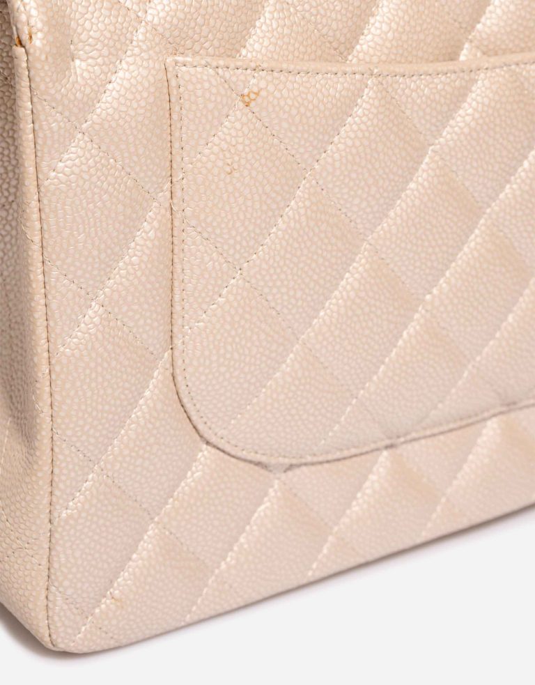 Chanel Timeless Jumbo Caviar Pearl Beige Signs of wear | Sell your designer bag