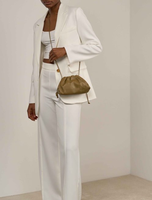 Bottega Veneta Pouch Mini Calf Brown on Model | Sell your designer bag