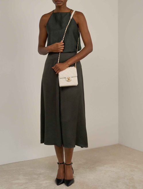 Chanel Timeless Mini Square Lamb Pearl White on Model | Sell your designer bag