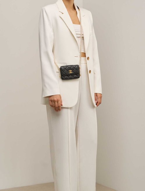 Chanel Timeless Extra Mini Square Lamb Black on Model | Sell your designer bag