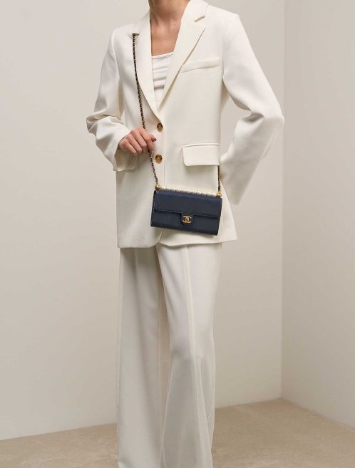 Chanel Wallet On Chain Timeless Lamb Dark Blue on Model | Sell your designer bag