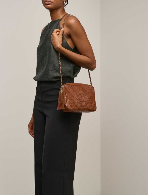 Chanel Camera Bag Medium Lamb Brown on Model | Sell your designer bag