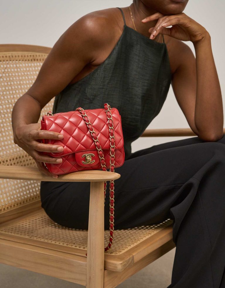 Chanel Timeless Mini Square Lamb Red on Model | Sell your designer bag