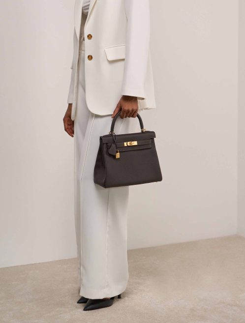 Hermès Kelly 28 Taurillon Clémence Macassar on Model | Sell your designer bag
