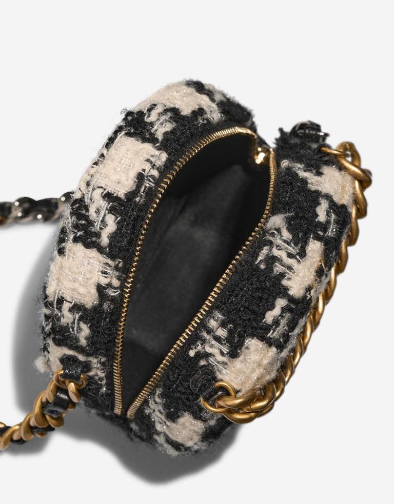 Chanel 19 Round Clutch Tweed Black / White Inside | Sell your designer bag