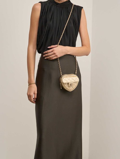Chanel Timeless Heart Small Lamb Gold on Model | Sell your designer bag