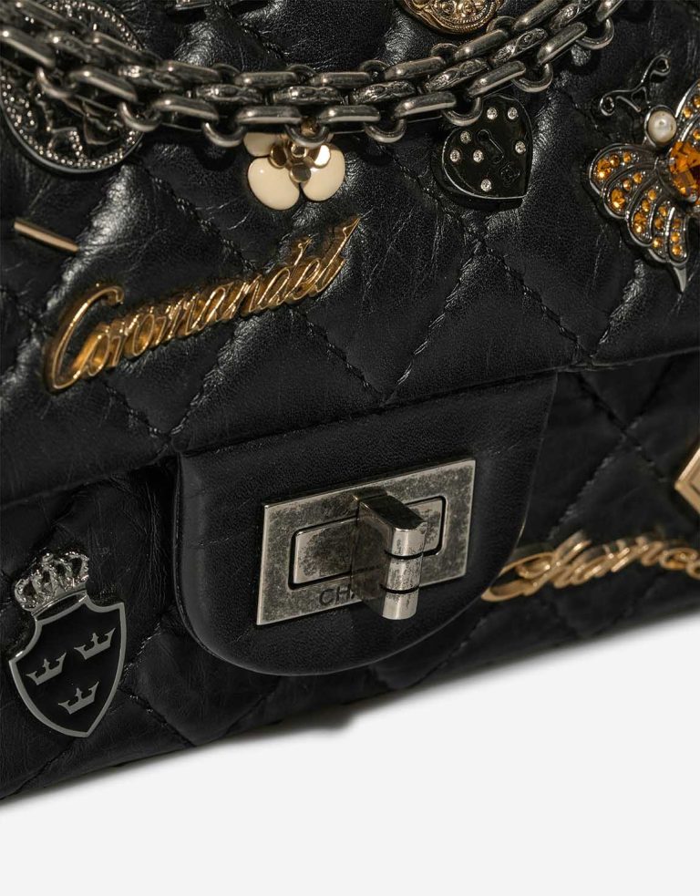 Chanel 2.55 Reissue Lucky Charms 225 Aged Calf Black Closing System | Sell your designer bag