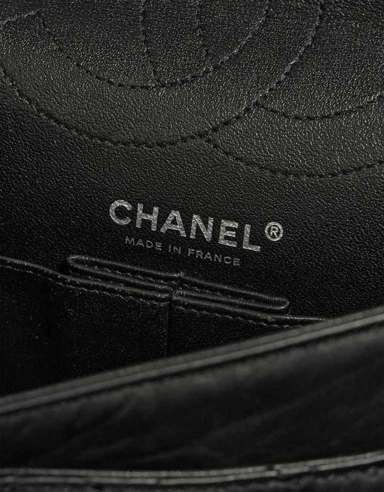 Chanel 2.55 Reissue Lucky Charms 225 Aged Calf Black Logo | Sell your designer bag