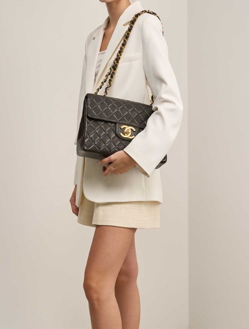 Chanel Timeless Jumbo Lamb Black on Model | Sell your designer bag