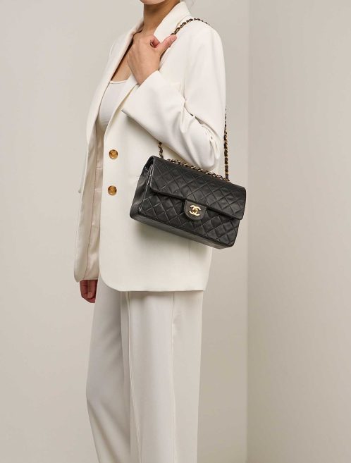 Chanel Timeless Medium Lamb Black on Model | Sell your designer bag